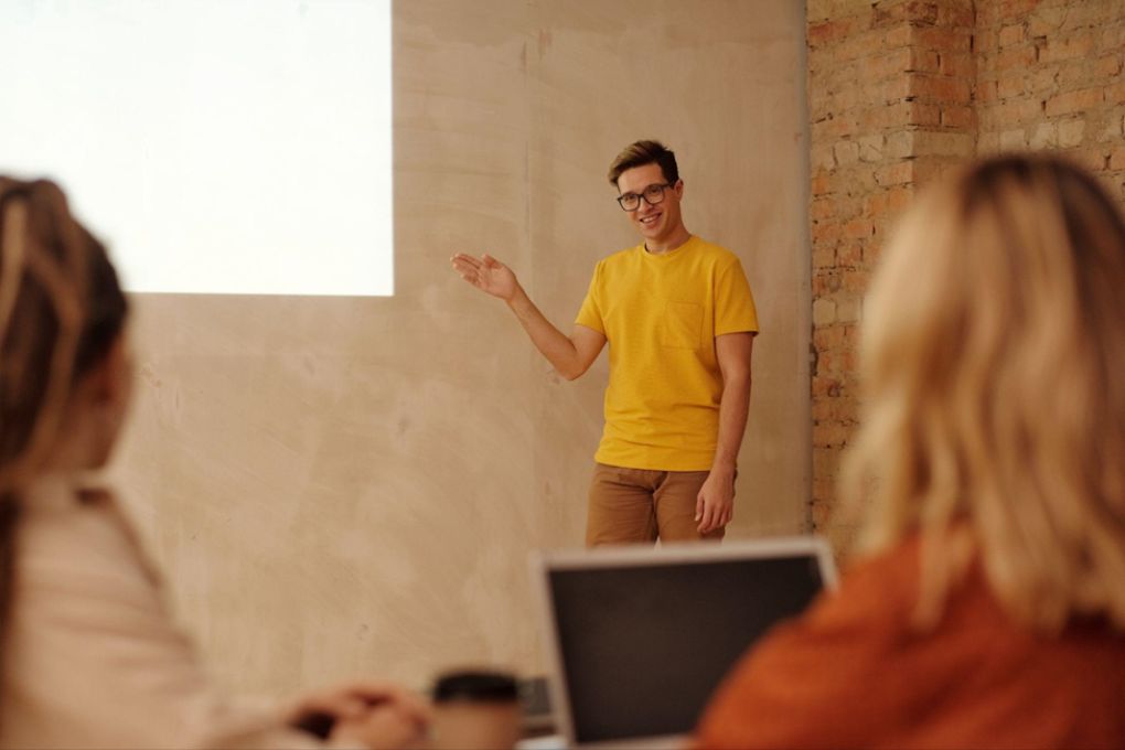 A man presenting his project,